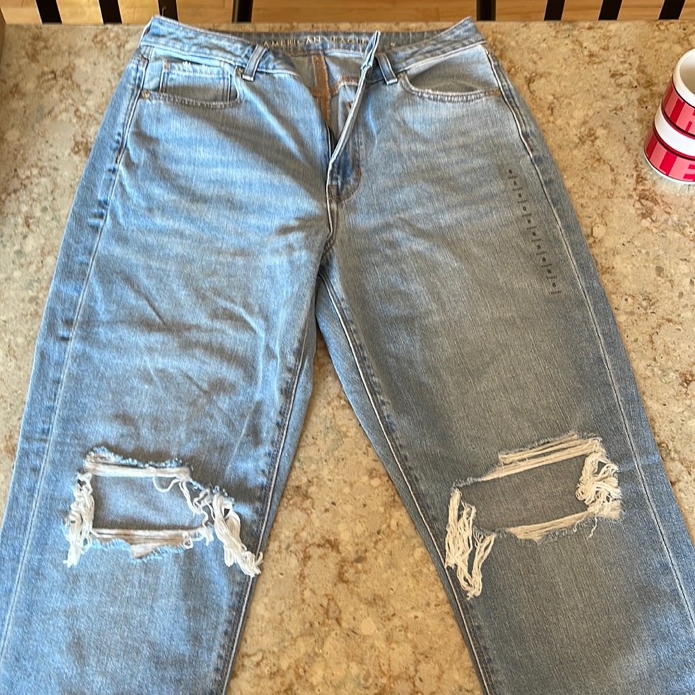AE mom jeans. Never worn.  Took tag off but size sticker still on.